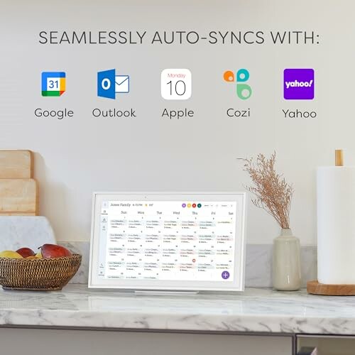 Digital calendar display showing auto-sync with Google, Outlook, Apple, Cozi, Yahoo.