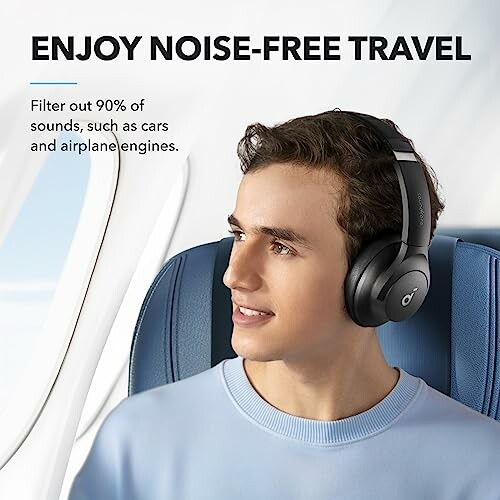 Man wearing noise-cancelling headphones on airplane.