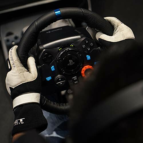 Person using a gaming racing wheel with gloves.